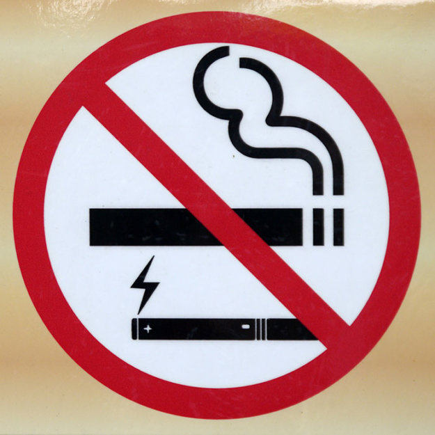 No smoking sign with red circle and slash prohibiting cigarettes and vaping.