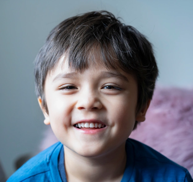 Young child smiling representing cleft lip and cleft palate repair dental services in Scottsdale