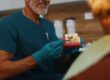 Prosthodontist in Scottsdale expalining to patient about dental implants
