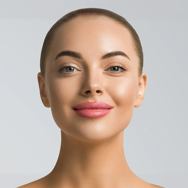 Close up of a smiling woman's face representing Juvederm facial filler cosmetic services at Dentistry of Old Town Scottsdale