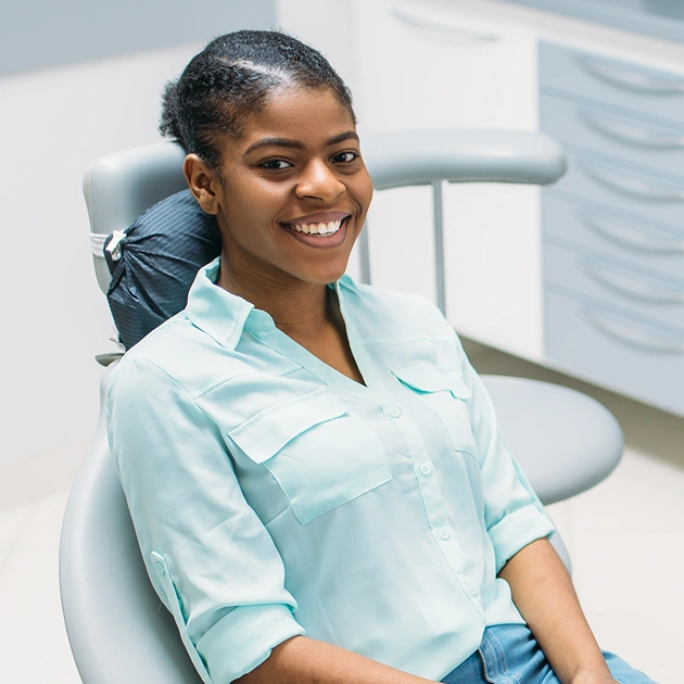 Dental professional in teal scrubs representing OraVerse reversal agent services at Dentistry of Old Town Scottsdale