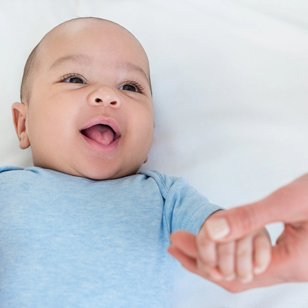 Smiling baby representing Six Month Smiles accelerated orthodontic treatment at Dentistry of Old Town Scottsdale