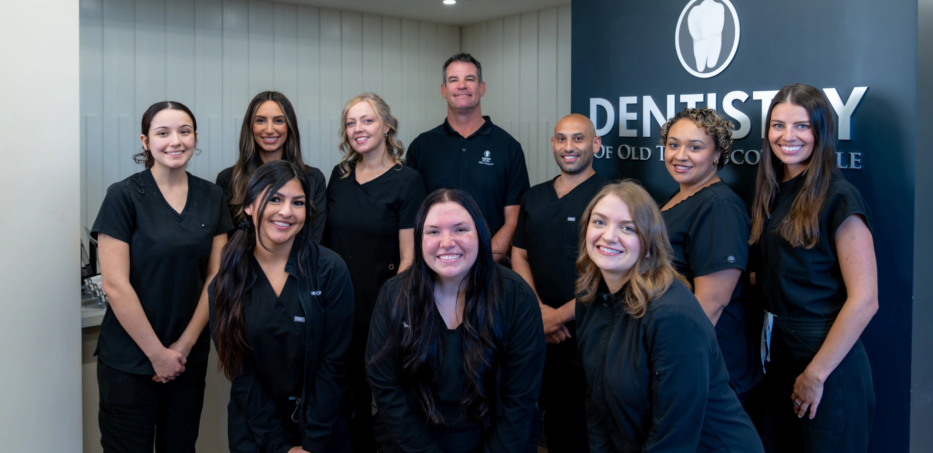 Dental team at Dentistry of Old Town Scottsdale smiling together