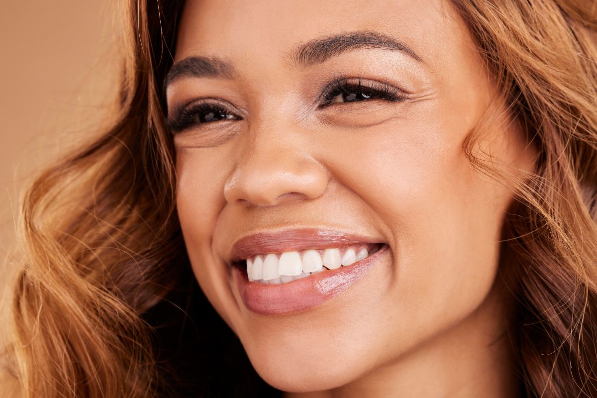 Close-up of woman smiling with bright white teeth after professional teeth whitening in Scottsdale